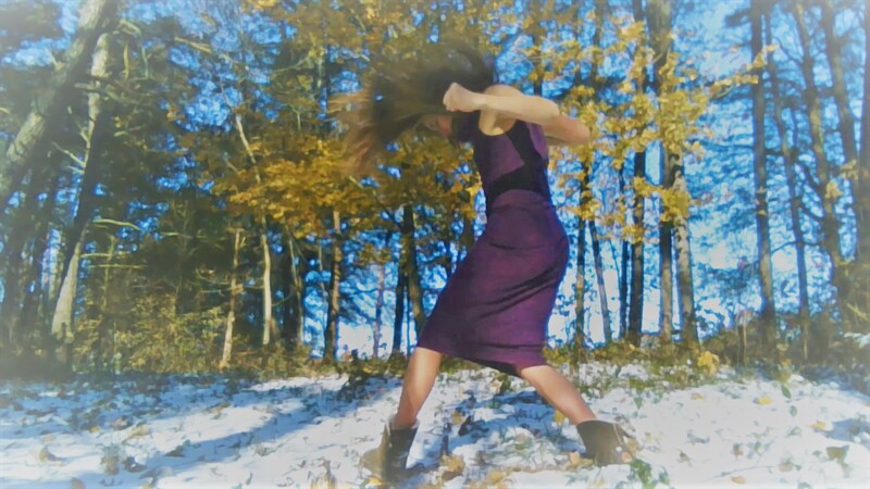Choreographer, Tessa Priem, doing dance improvisation outdoors
